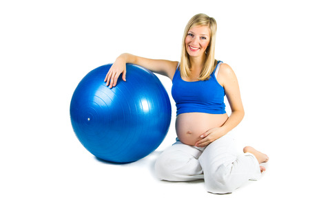 Pregnant woman isolated on whiteの写真素材