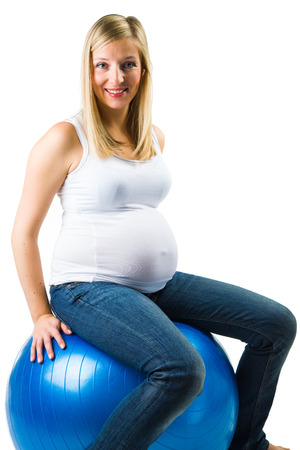Pregnant woman isolated on whiteの写真素材
