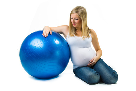 Pregnant woman isolated on whiteの写真素材