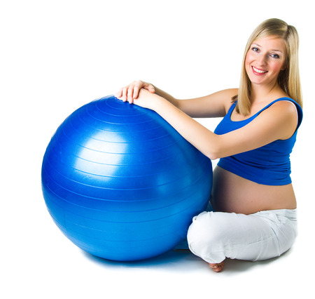 Pregnant woman isolated on whiteの写真素材