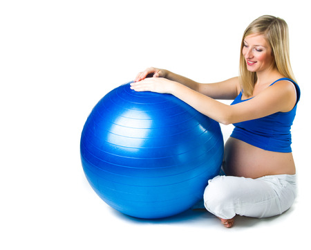 Pregnant woman isolated on whiteの写真素材
