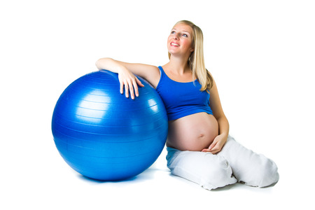 Pregnant woman isolated on whiteの写真素材