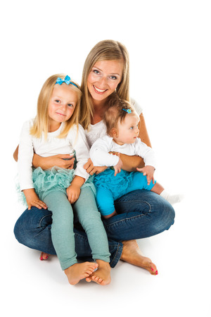 Mother with two young daughtersの写真素材