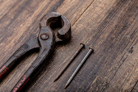 nails tool on wood top view