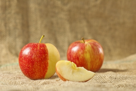 Two fresh red apple and sliceの写真素材