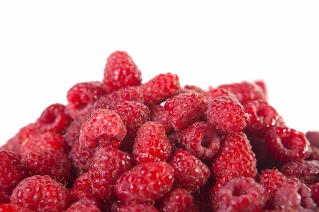 Fresh raspberries isolated on white の写真素材