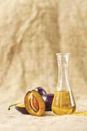 Plum brandy over a background の写真素材