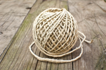 Rope knot on wooden backgroundの写真素材