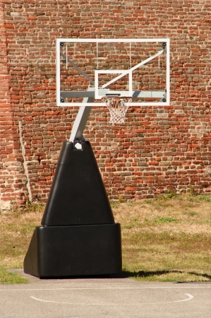 Basketball hoop on basketball court outdoorの写真素材