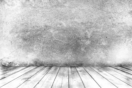 Empty room with wooden floor and concrete wall, interior backgroundの写真素材