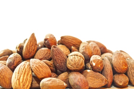 Pile of almonds closeup as a backgroundの写真素材
