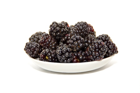 Beautiful blackberries isolated on whiteの写真素材