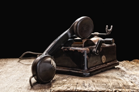 An old phone in dusty and rusty condition  の写真素材