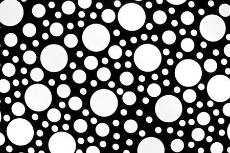 Abstract white circles on black backgroundの写真素材