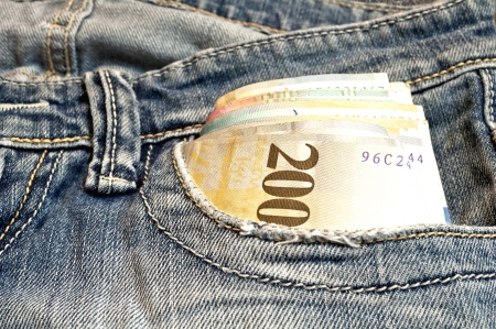 Money in front-pocket of jeans  Swiss Franc bank note の写真素材