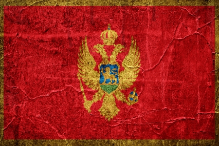Flag of Montenegro overlaid with grunge textureの写真素材