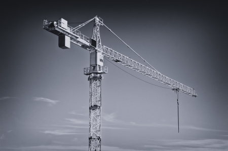 Huge industrial crane, black and white image 