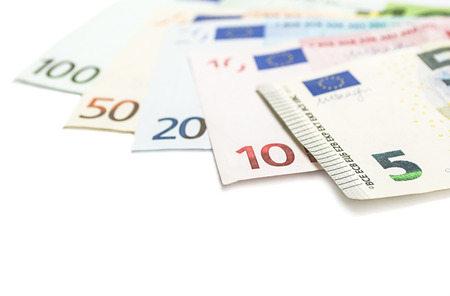 Set of euro banknotes isolated on white background. Shallow depth of field.の写真素材