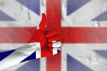 Hand covered in flag of United Kingdomの写真素材