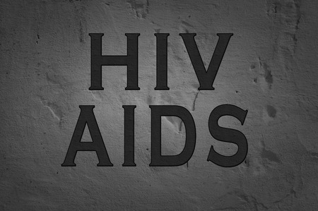 Word Hiv Aids isolated on dark backgroundの写真素材