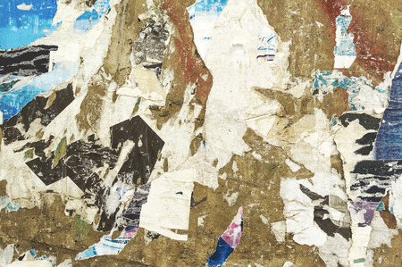 Torn posters grunge textures and backgrounds.の写真素材