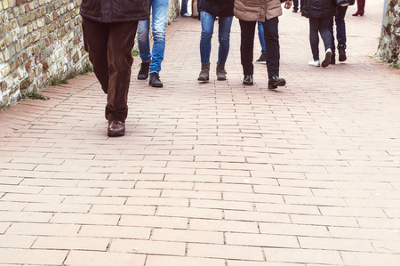 Crowd of people walking on a streetの写真素材