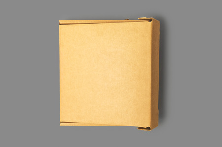 Cardboard box isolated on a gray background