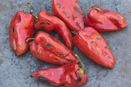 Roasted red peppers on the barbecue. Selective focus.の写真素材