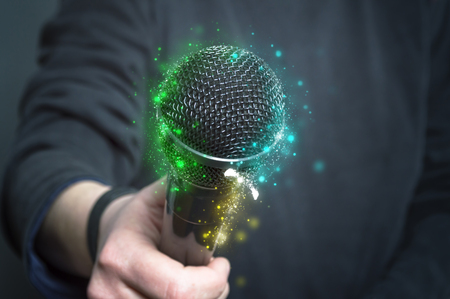 Microphone in hand.の写真素材