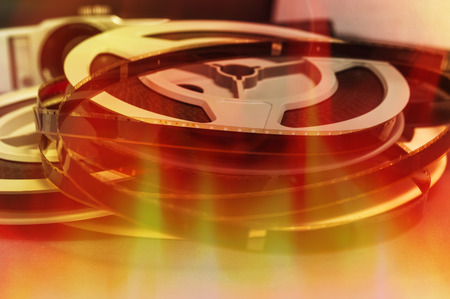Still life of 8mm cine film reels with flame background.の写真素材