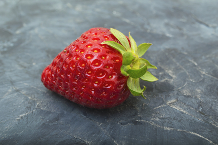 Fresh strawberry fruit on dark backgroundの写真素材