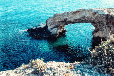 The bridge of love or love bridge is located in one of the most beautiful tourist attractions in Ayia Napa, Cyprus.の写真素材