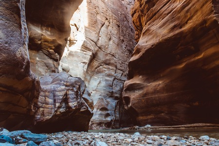 River canyon of Wadi Mujib in amazing golden light colors. Wadi Mujib is located in area of Dead Sea in Jordanの写真素材