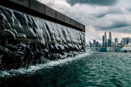 Nov 2018. Petronas Twin towers seen from skyscrapper's roof with pool, Kuala Lumpur central park, KLCCのeditorial素材