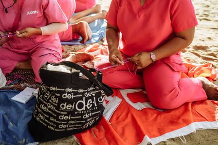 Bohol Island, Philippines- 5/11/2016 Tourists were enjoying massage service under a palm tree on the beach.Massage business was a common business on the beach in Mindoro Island.のeditorial素材