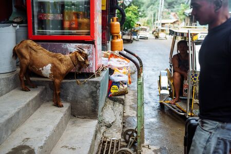 Puerto Galera, Philippines - Nov, 2016: Tuk tuk on the street. Typical Asian streetのeditorial素材