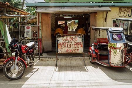 Puerto Galera, Philippines - Nov, 2016: Tuk tuk on the street. Typical Asian streetのeditorial素材