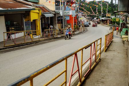 Puerto Galera, Philippines - Nov, 2016: Tuk tuk on the street. Typical Asian streetのeditorial素材