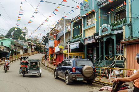 Puerto Galera, Philippines - Nov, 2016: Jeepney staying to pick up passengers, crossroad, day timeのeditorial素材