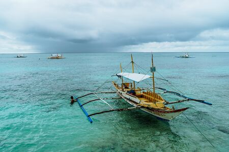 BORACAY BEACH,PHILIPPINES-NOVEMBER 20, 2016: Boats on Boracay beach in Philippinesのeditorial素材