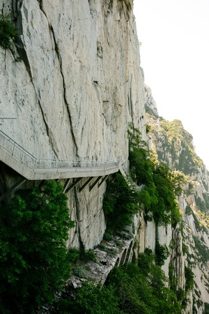 Trail and cliffs in Songshan Mountain, Dengfeng, China. Songshan is the tallest of the 5 sacred...