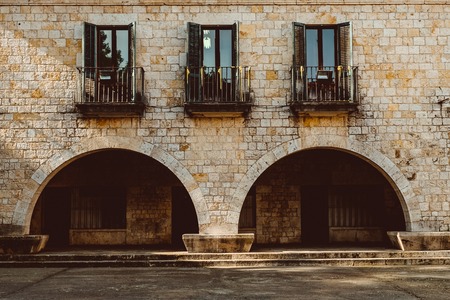 Narrow street in old town. Girona, Catalonia, Spainの写真素材
