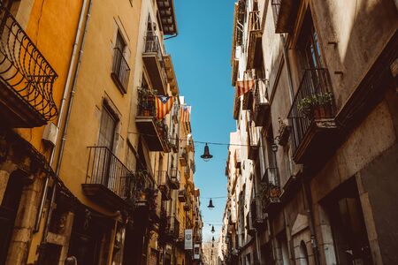 Girona, Spain - February, 2019: Narrow street in old town. Girona, Catalonia, Spainのeditorial素材