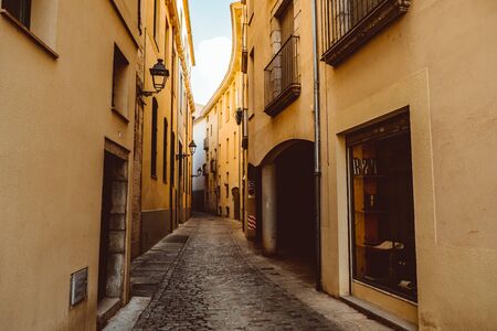 Girona, Spain - February, 2019: Narrow street in old town. Girona, Catalonia, Spainのeditorial素材