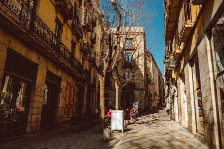 Girona, Spain - February, 2019: Narrow street in old town. Girona, Catalonia, Spainのeditorial素材
