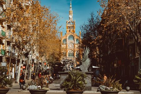 BARCELONA, SPAIN, February 2019: View of a street leading to the former Hospital de la Santa Creu i Sant Pau in Barcelona, Spain.のeditorial素材