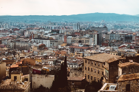 Cityscape, view of Girona, Catalonia, Spain. The Girona Cathedral. View from the city wall. February 2019の写真素材