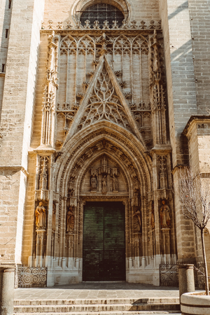 Gothic exterior of the Cathedral of Saint Mary of the See Seville Cathedral in Seville, Andalusia, Spain 2019の写真素材