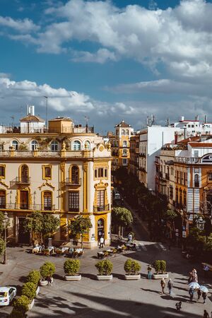 Seville, Spain, February 2019: beautiful view of street in city center with historic buildings and old architecture, aerial view, dramatic sky. Seville, Andalusia, Spainのeditorial素材