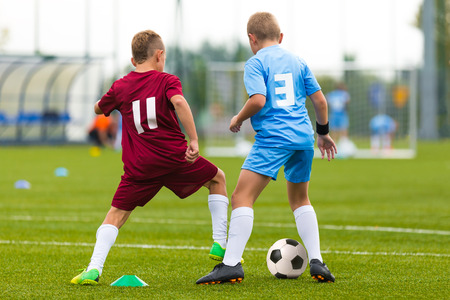 Football match for children. Training and football soccer tournamentの写真素材